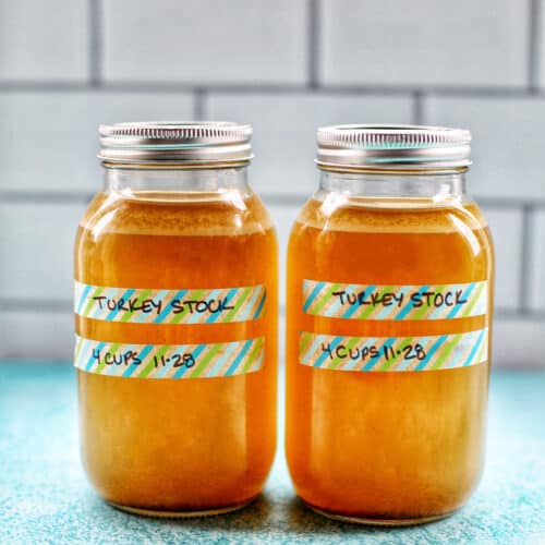 two mason jars full of Homemade Turkey Stock