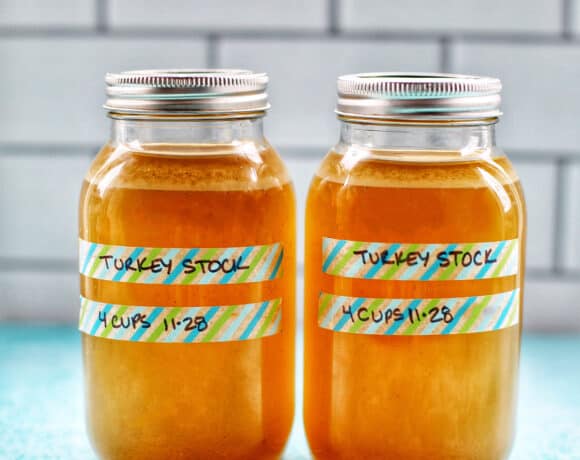 two mason jars full of Homemade Turkey Stock