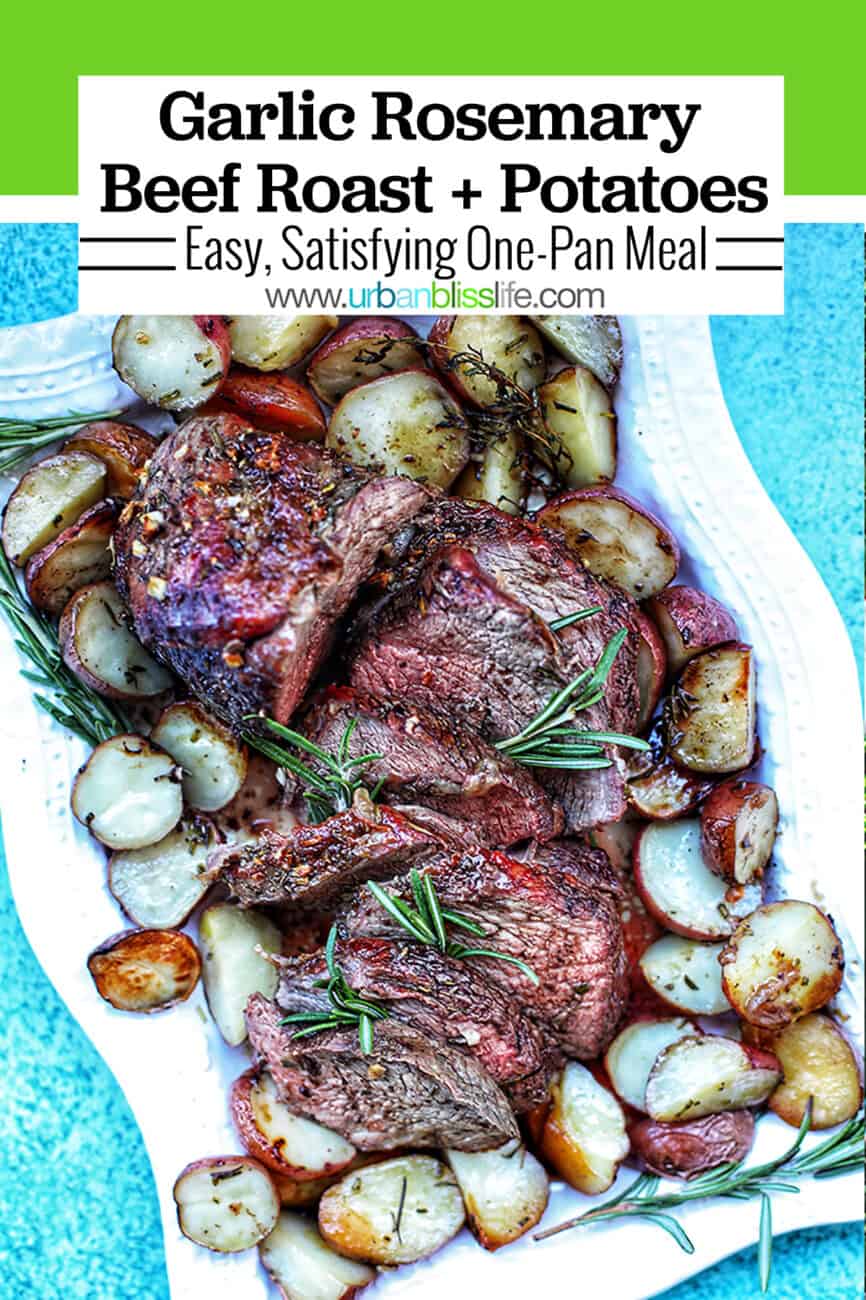 Garlic Rosemary Sirlopin Tip Roast sliced on platter with potatoes