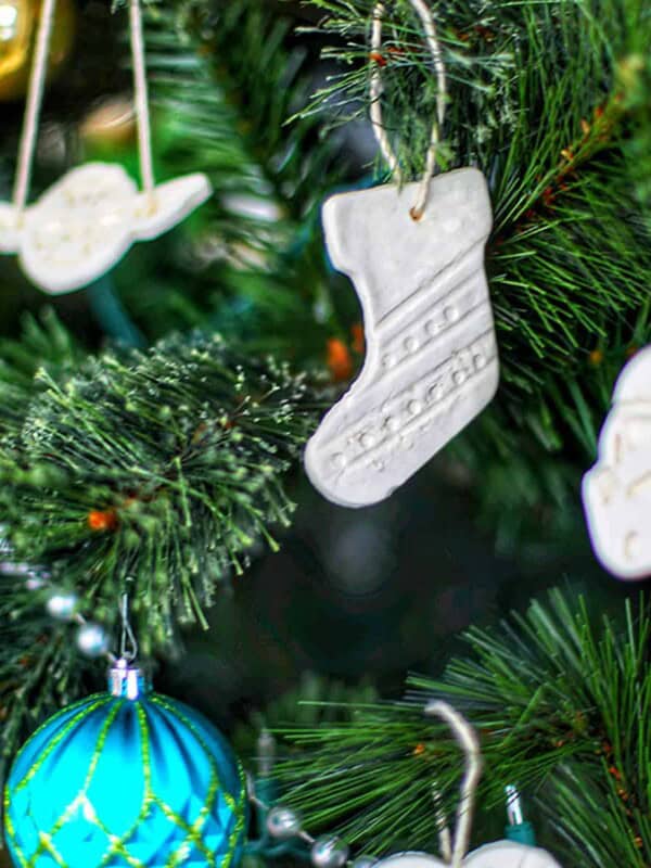 baking soda ornaments hanging on a christmas tree.