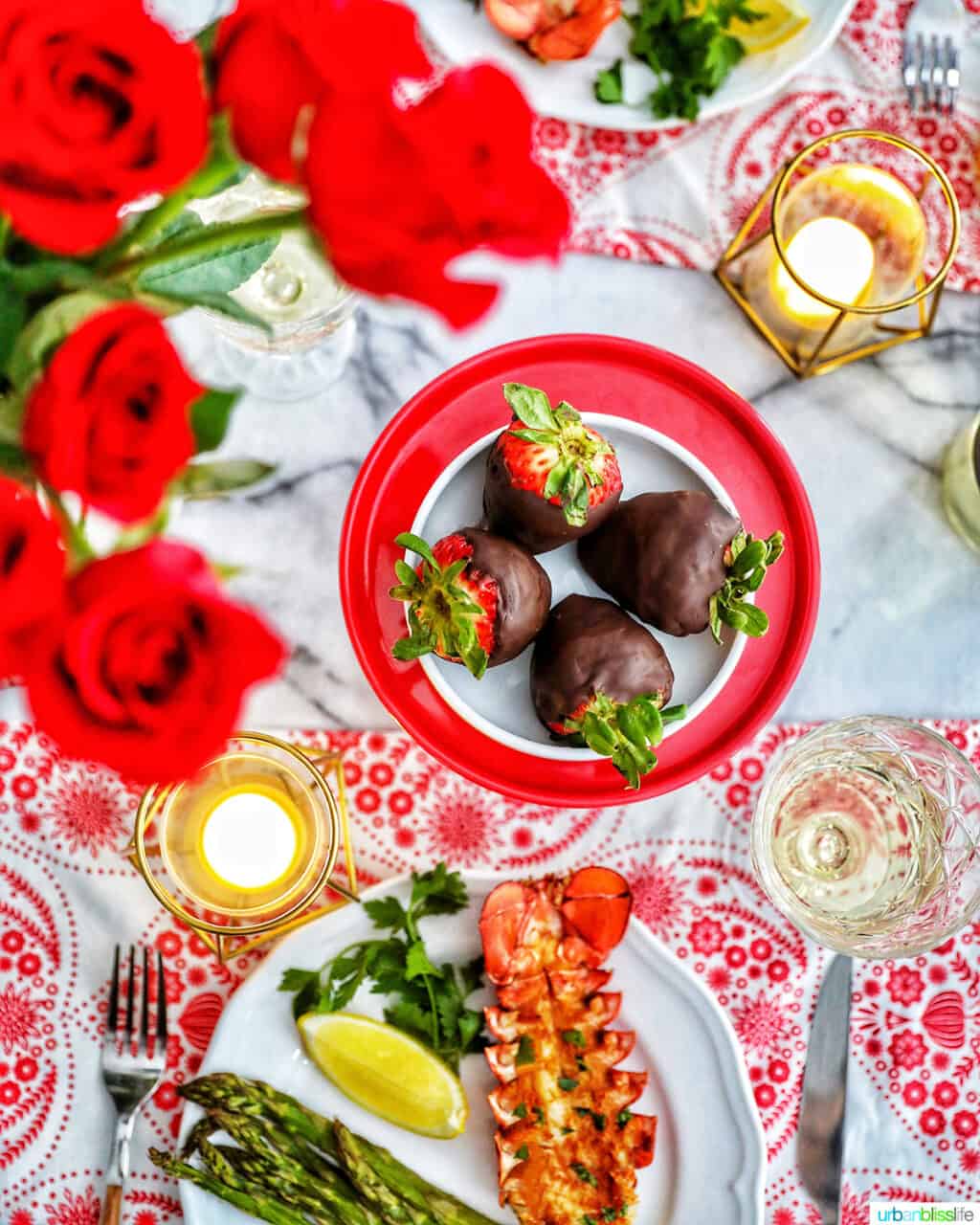 Valentine's Day dinner lobster chocolate covered strawberries roses candles wine