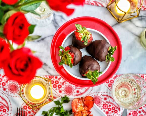 Valentine's Day dinner lobster chocolate covered strawberries roses candles wine