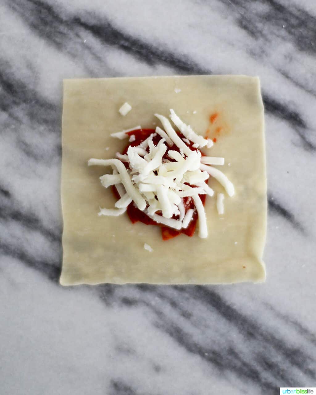 assembling air fryer pizza rolls