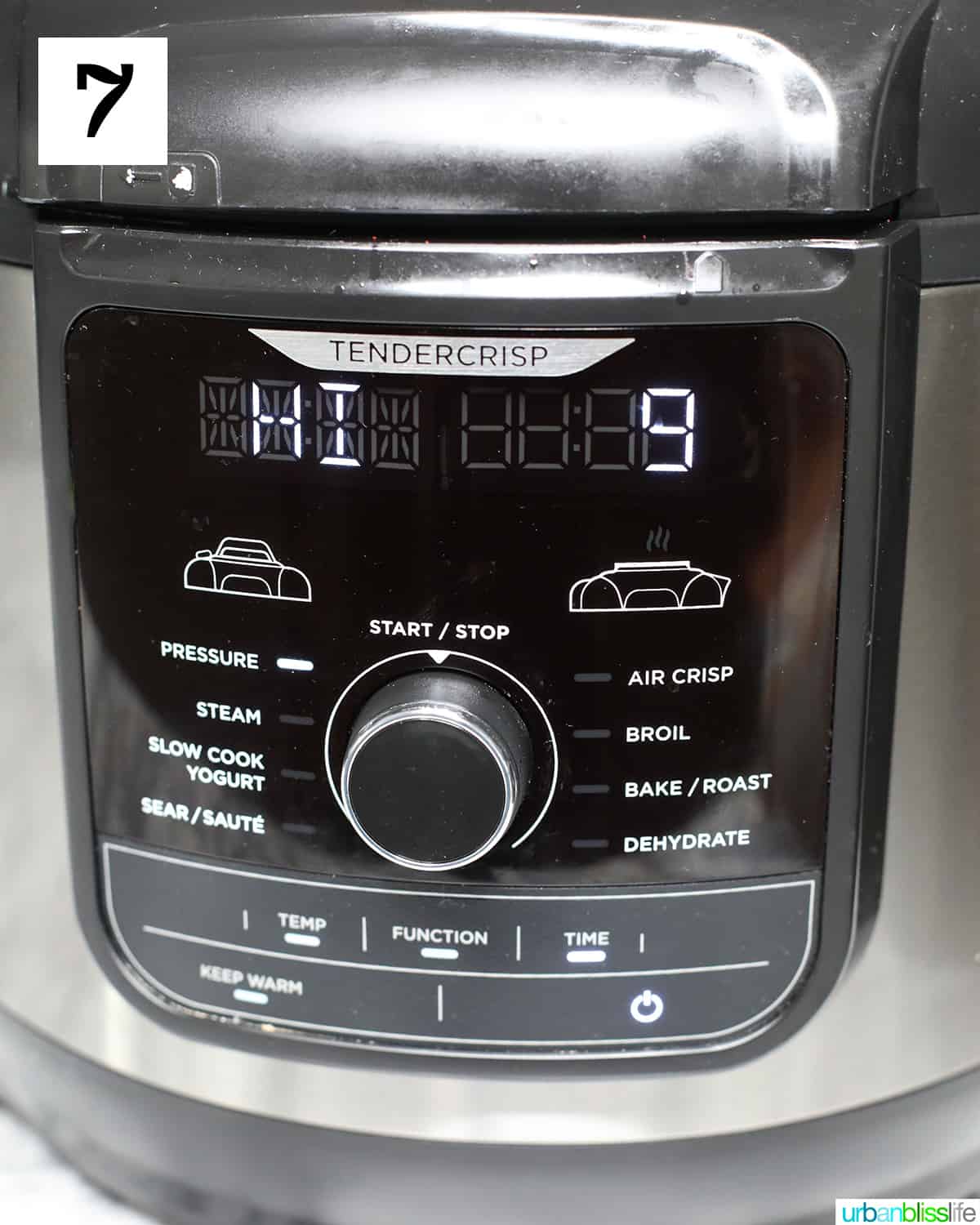 Ninja Foodi pressure cooker set to Pressure Cook on HI for 9 minutes.