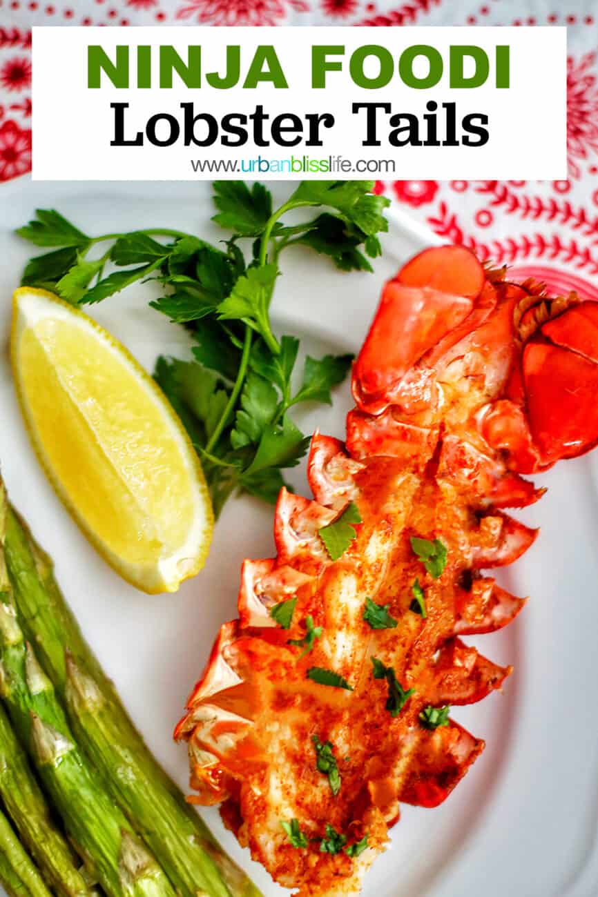 lobster tails with lemon wedge and asparagus and text for Pinterest