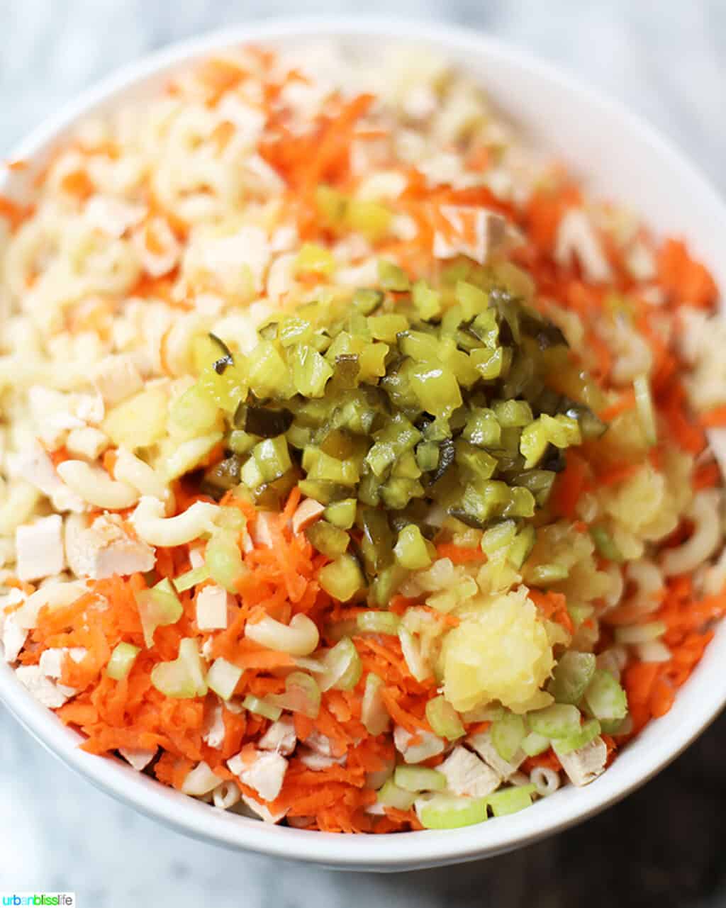 ingredients for Filipino Macaroni Salad mixing in bowl