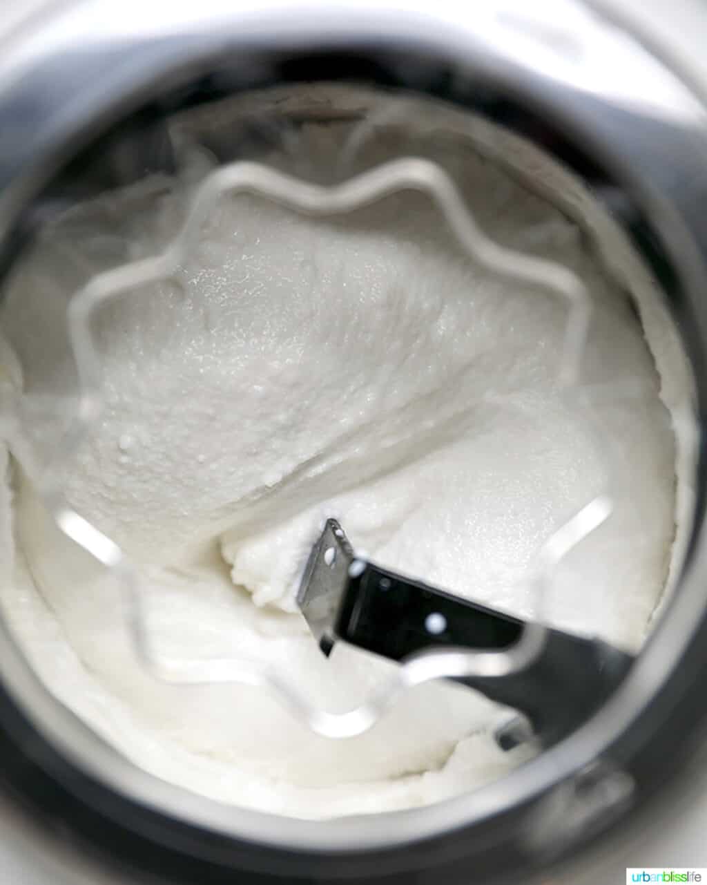 dairy-free chocolate chip ice cream churning in the ice cream maker