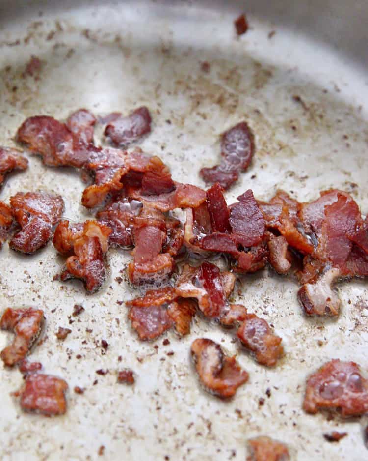 cooking bacon in a skillett