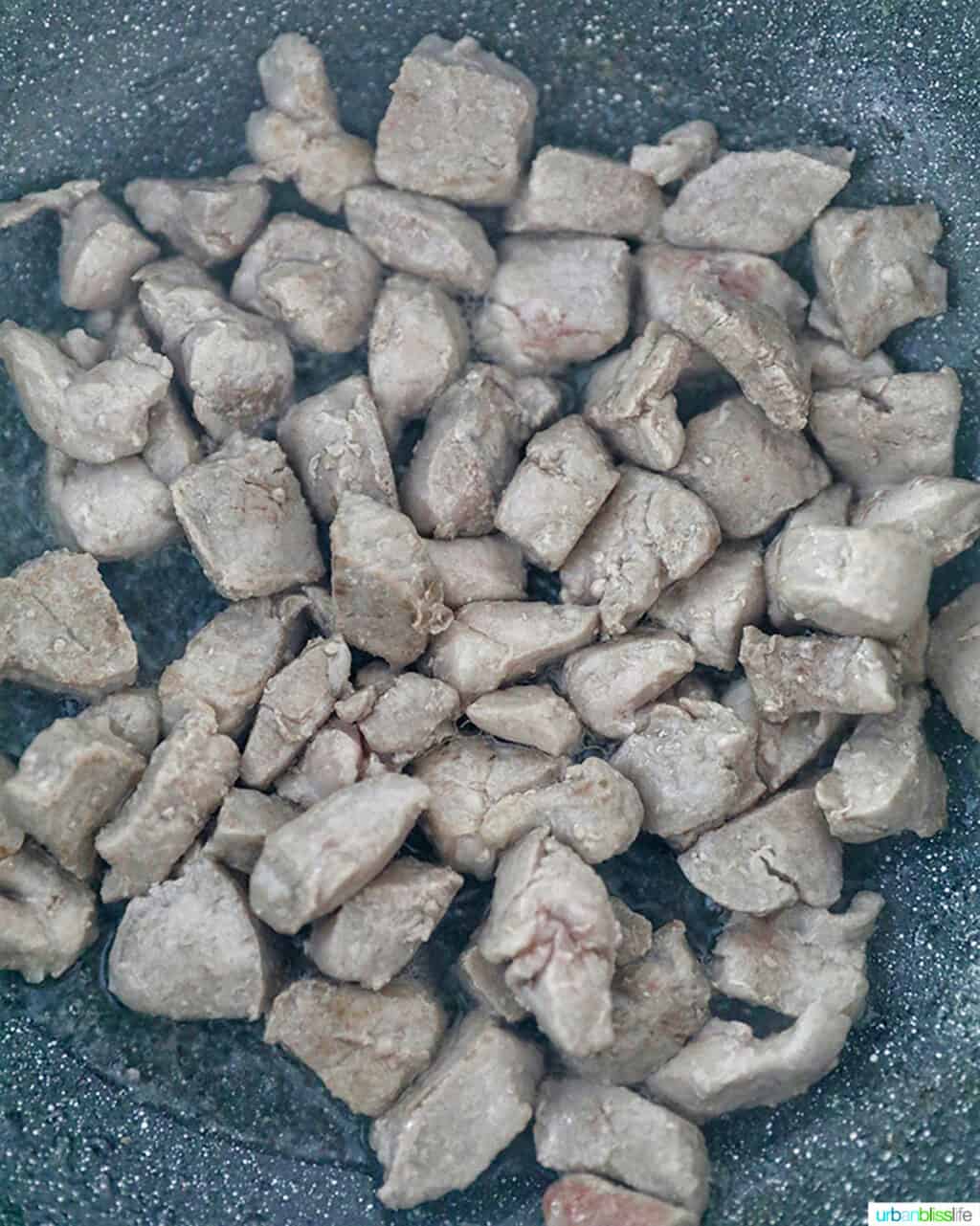 cooking pork for Filipino Pancit Bihon