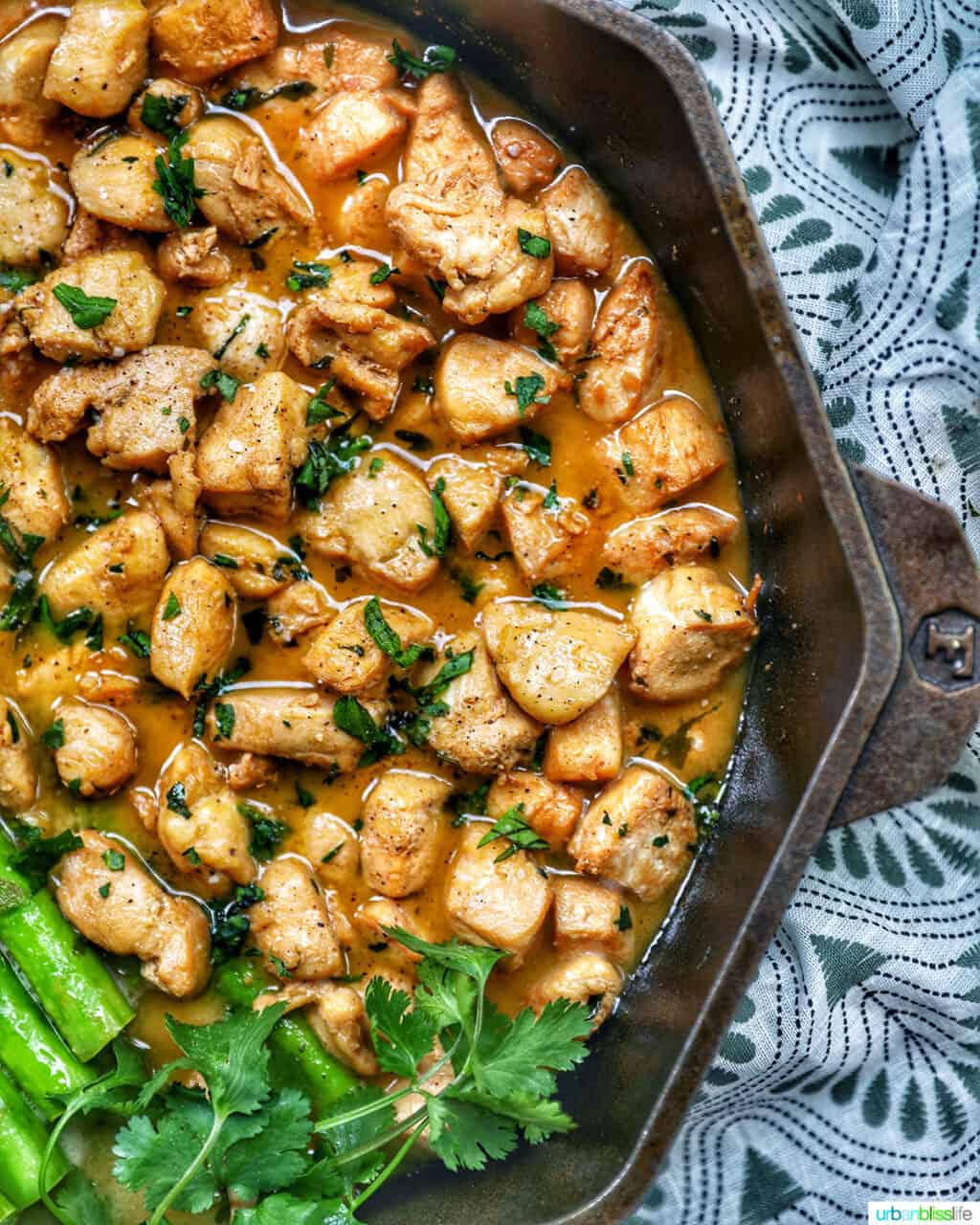 soy garlic butter chicken bites in cast iron pan