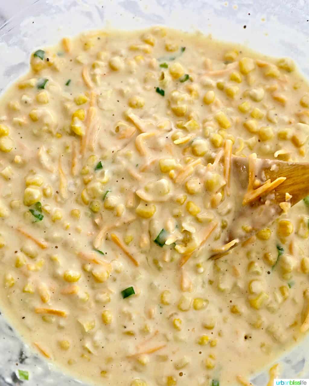 mixing corn fritter batter