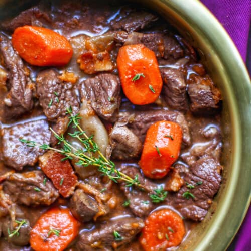 close up of beef bourguignon in big bowl