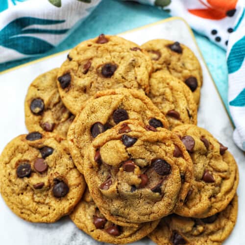 stack of batter for brown butter chocolate chip cookies