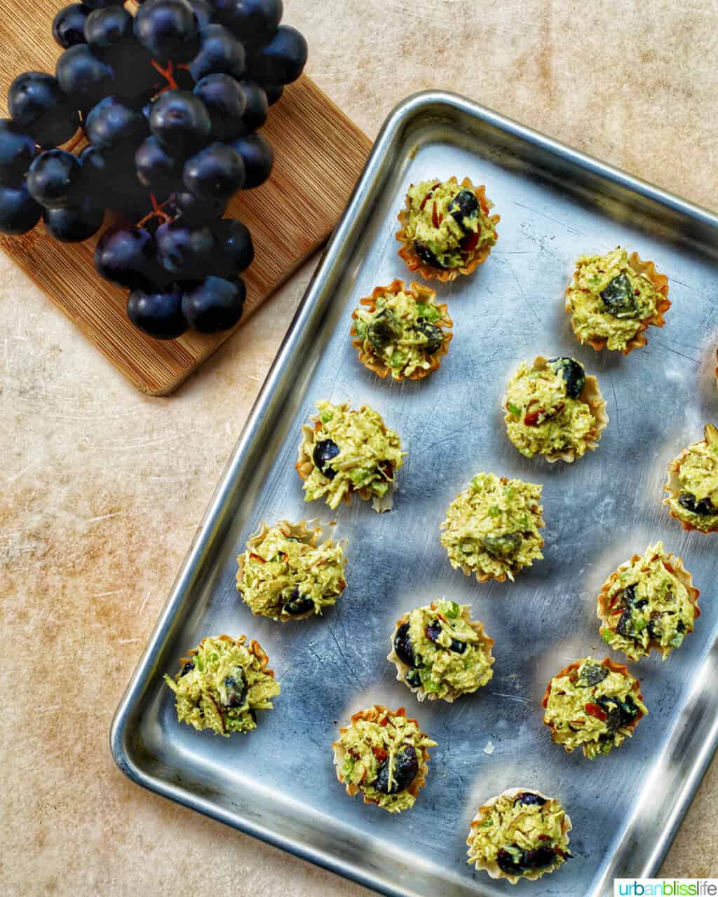 baking sheet of curry chicken salad with grapes