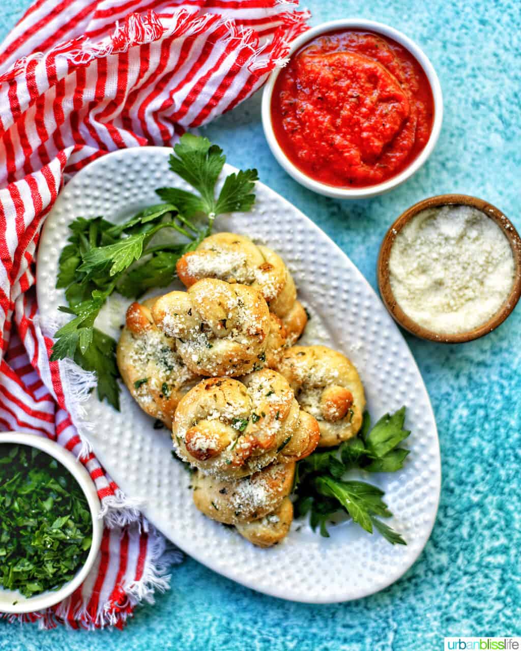 garlic parmesan knots with red sauce