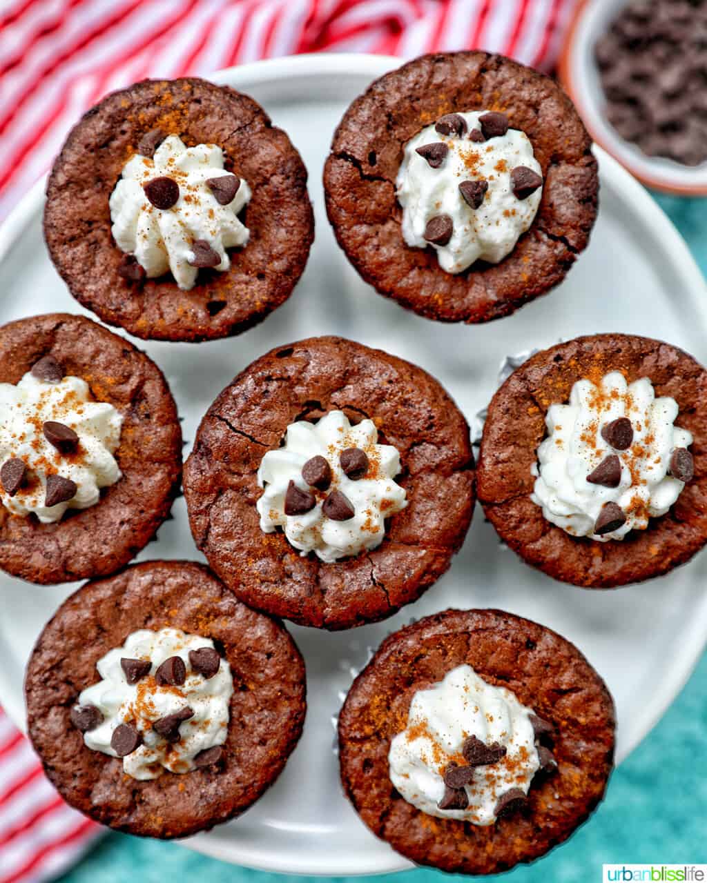 Mini Brownie Bites Eggnog Whipped Cream on white plate