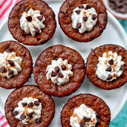 Mini Brownie Bites Eggnog Whipped Cream on white plate