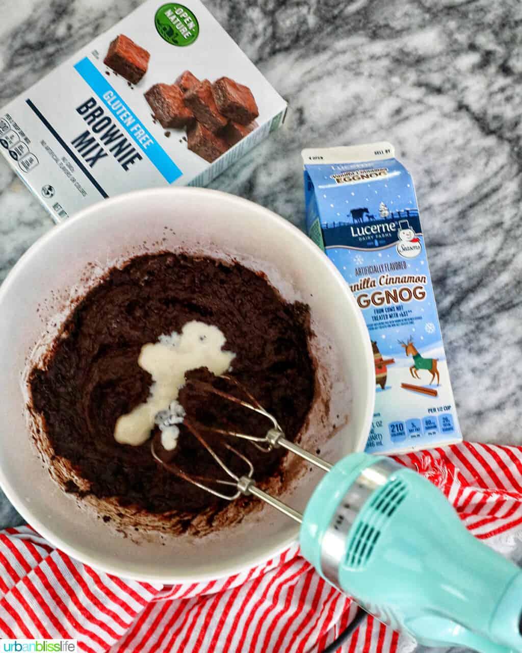 mixing eggnog into brownie batter