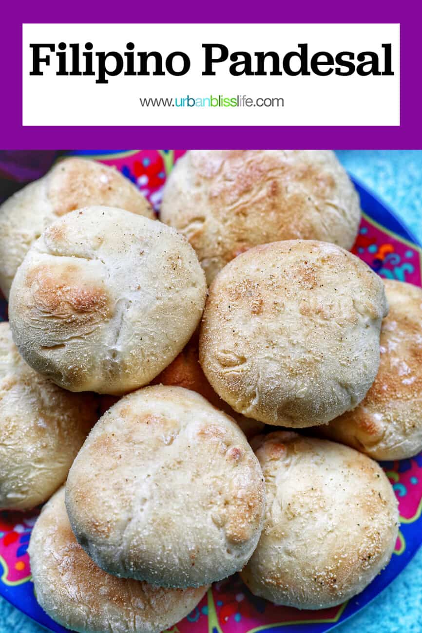colorful plate with baked Filipino Pandesal rolls with text overlay