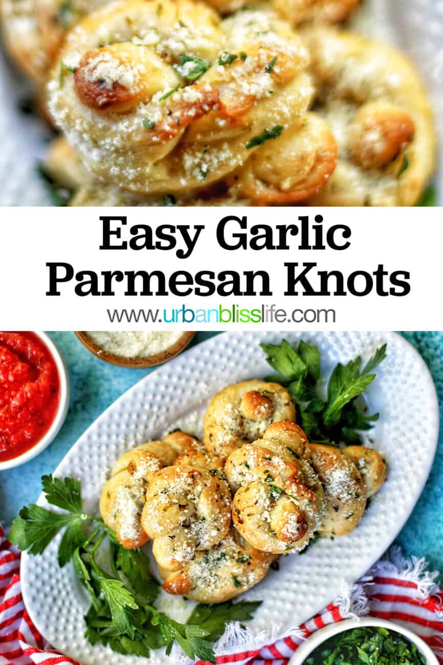 garlic parmesan knots on a white platter with sides of dipping sauce, cheese, parsley