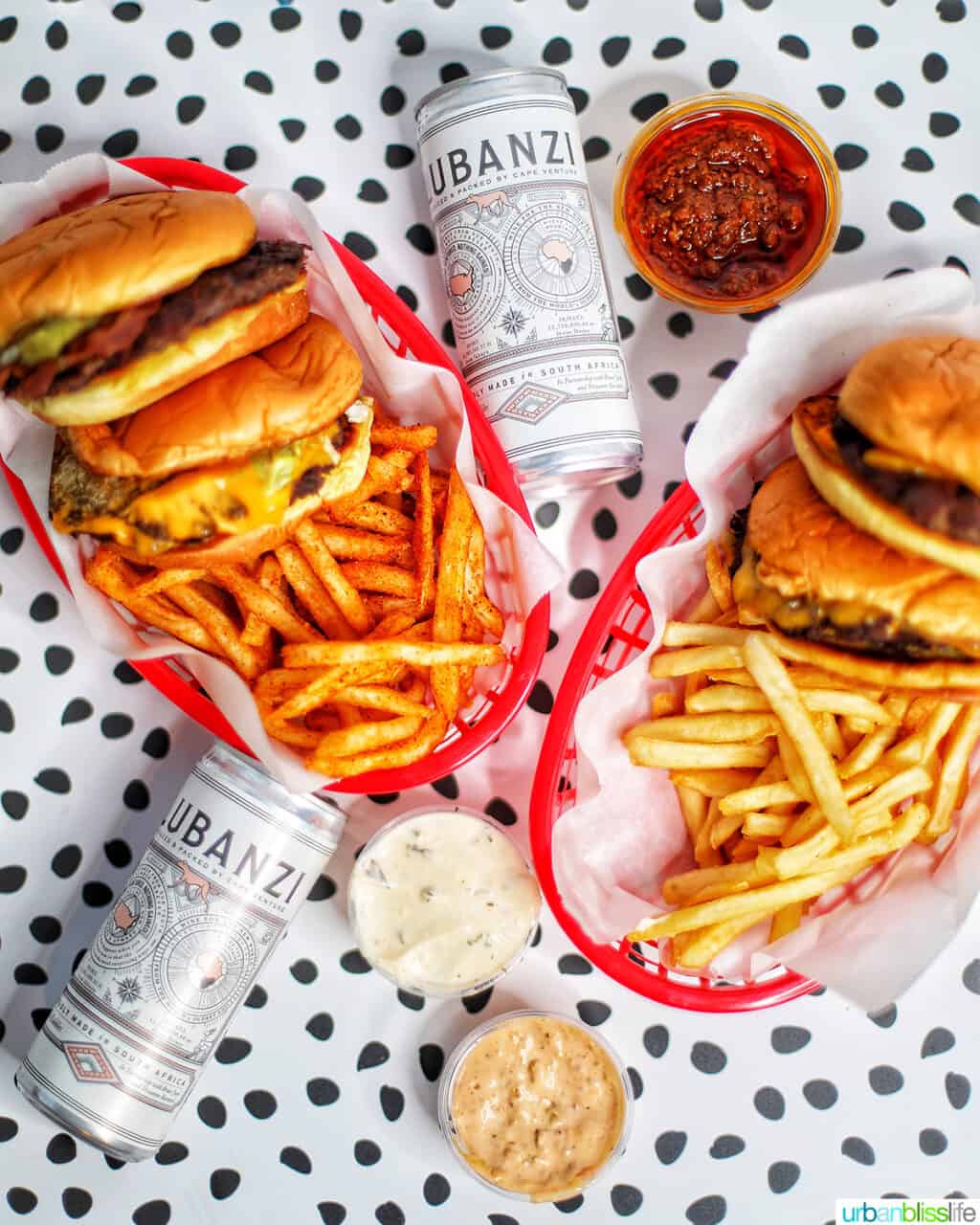 baskets of burgers and fries.