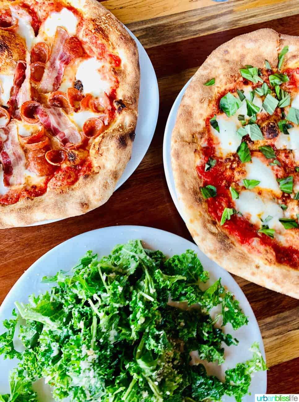two pizzas and a salad.