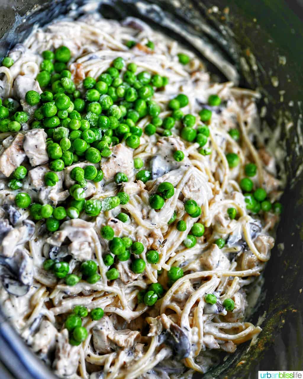 adding peas to crockpot