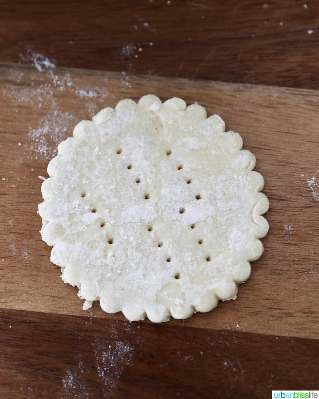 fork tine holes poked on dough
