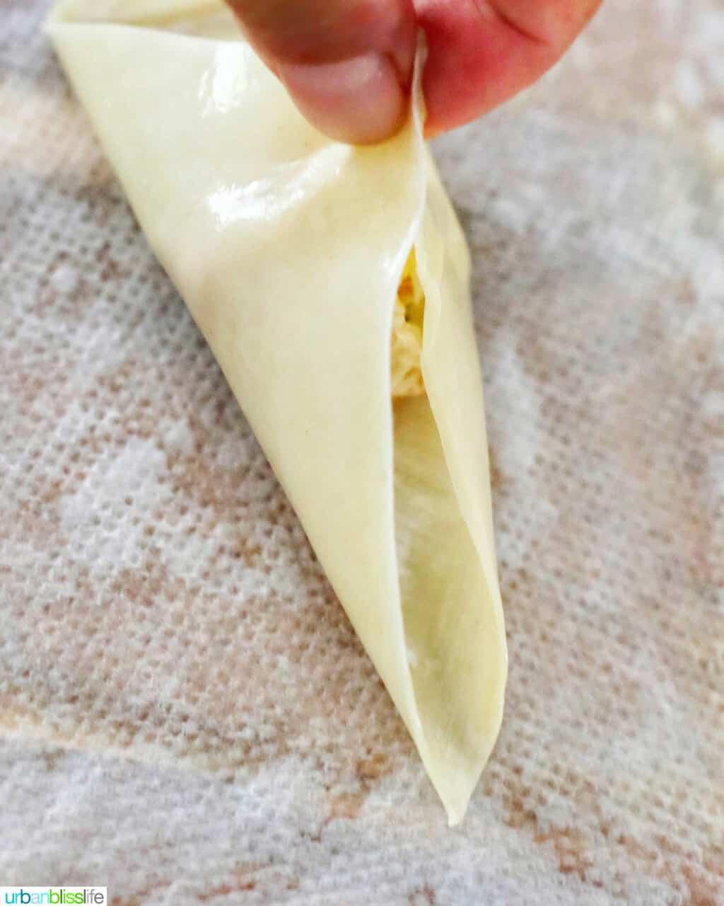 assembling crab rangoon wontons