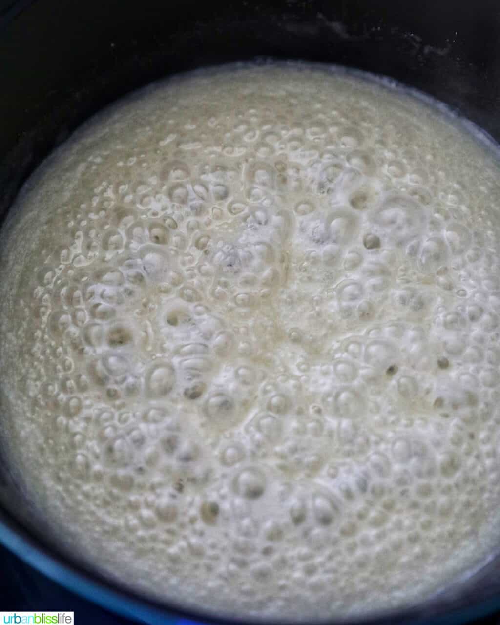 light colored caramel bubbling in pan