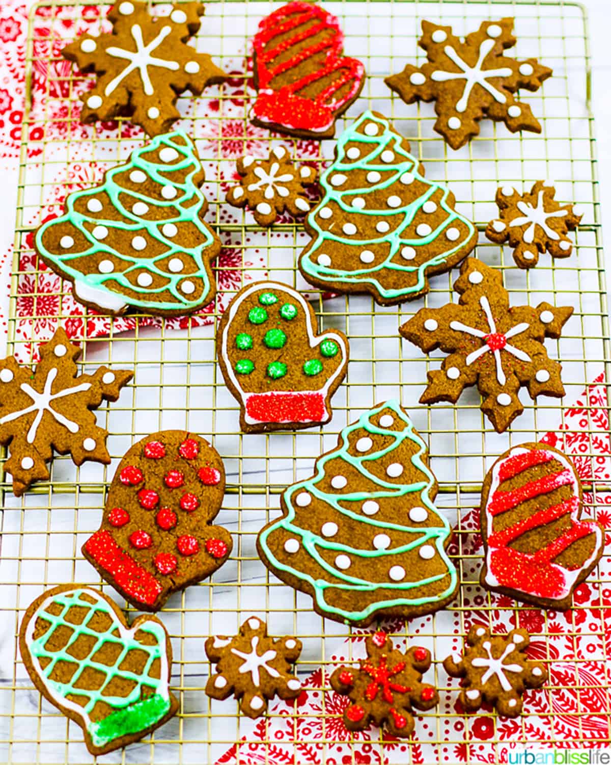 Soft Gingerbread Cookie Recipe - decorated cookies in holiday shapes