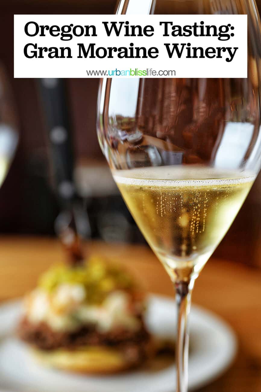 Glass of sparkling wine at Gran Moraine Winery with text overlay