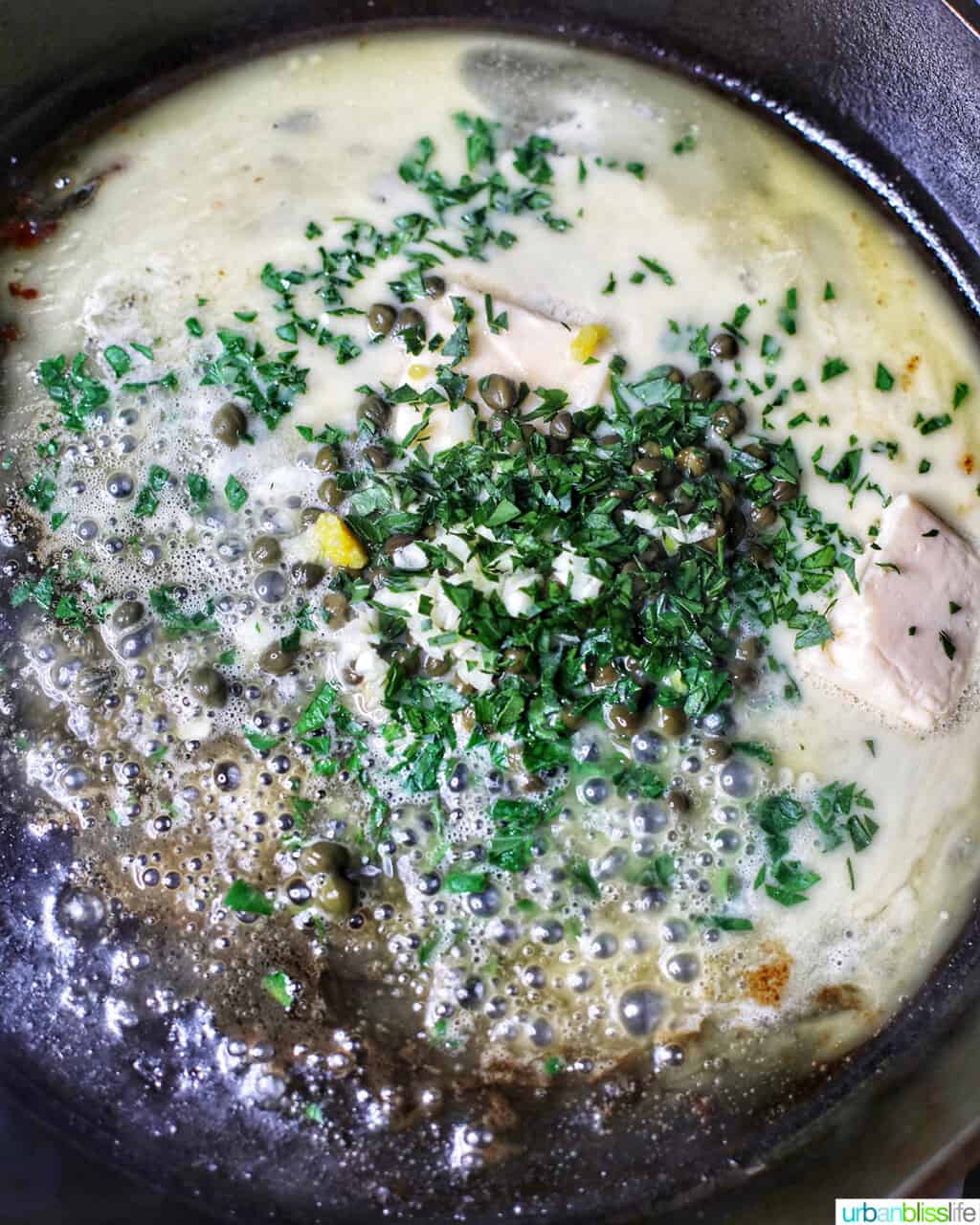 adding peas to butter in a pan