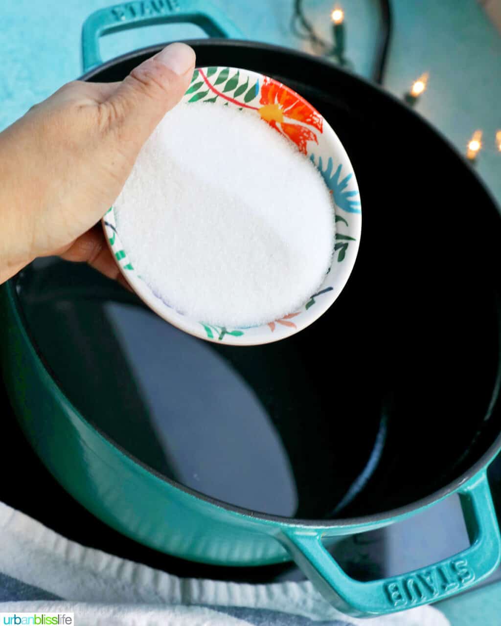 adding sugar to pot