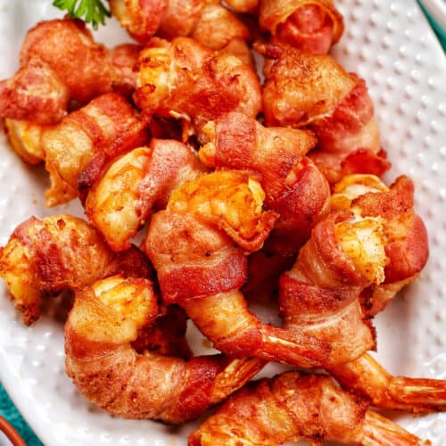 air fryer bacon wrapped shrimp on a plate FEATURE