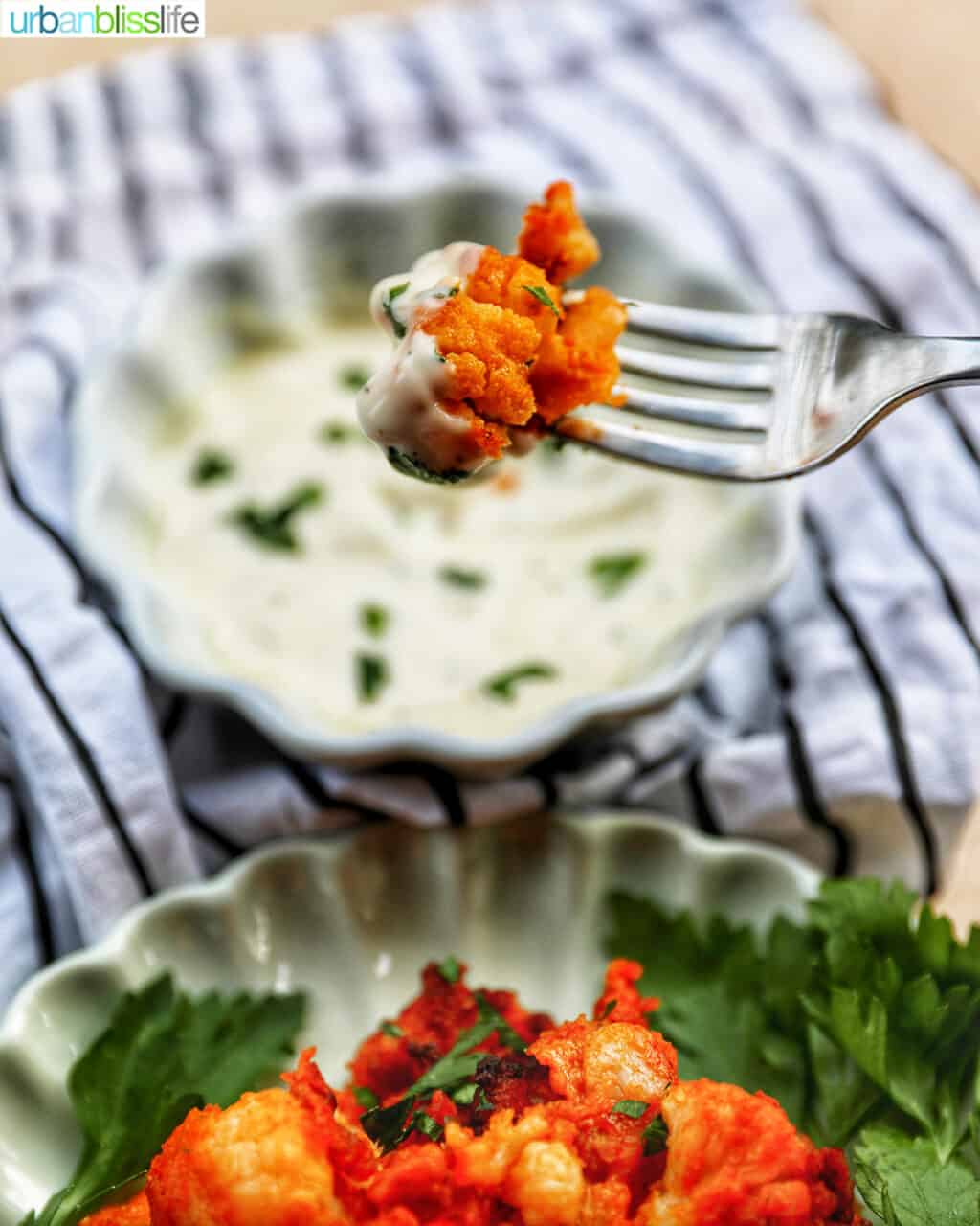 fork full of air fryer buffalo cauliflower