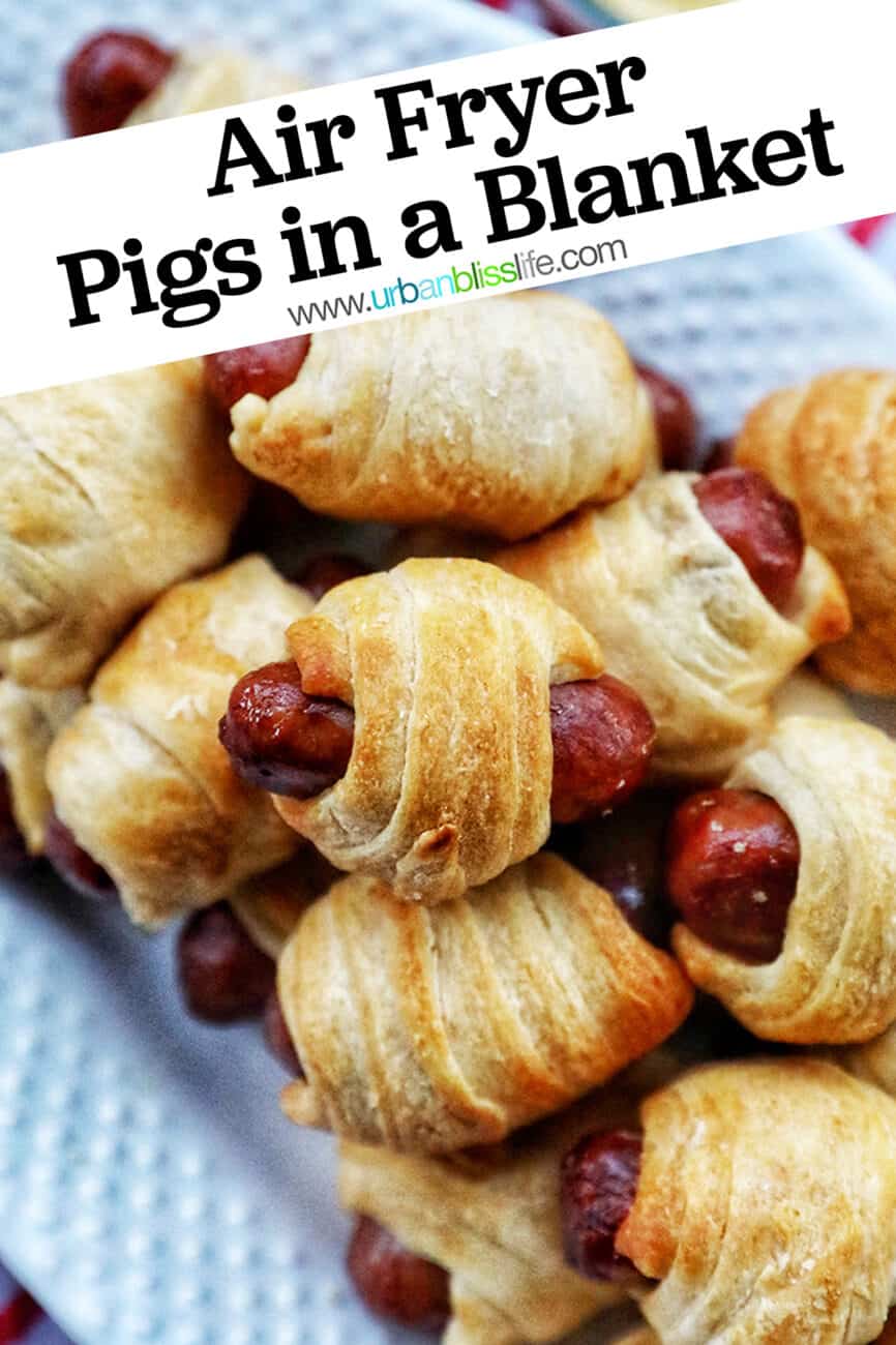 air fryer pigs in a blanket on white platter with text overlay.