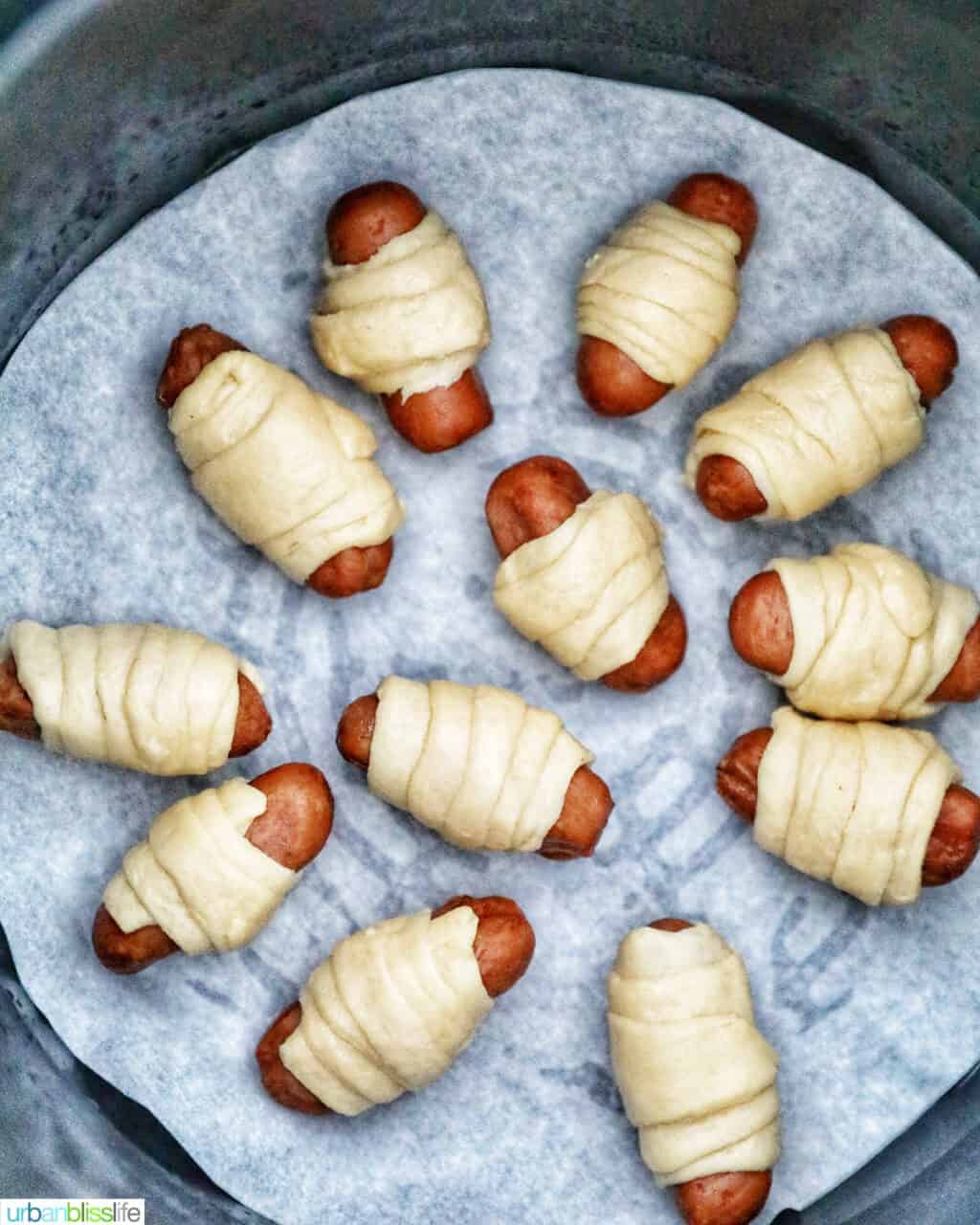 Air Fryer Pigs in a Blanket in air fryer basket