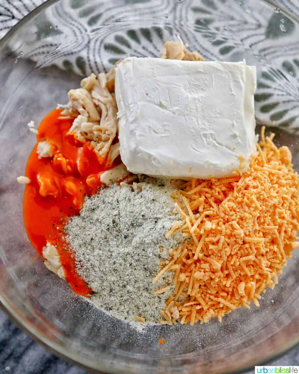ingredients in a bowl to make buffalo chicken bites