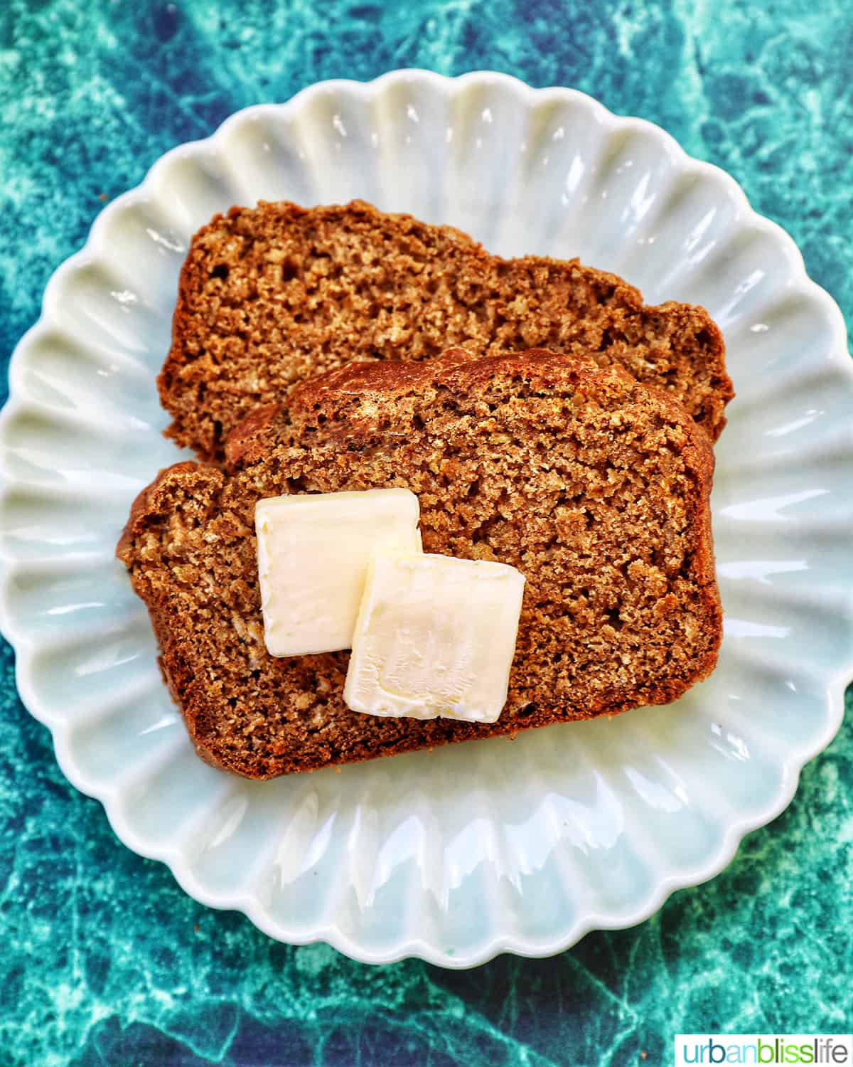 slices of Guinness brown bread with pats of butter
