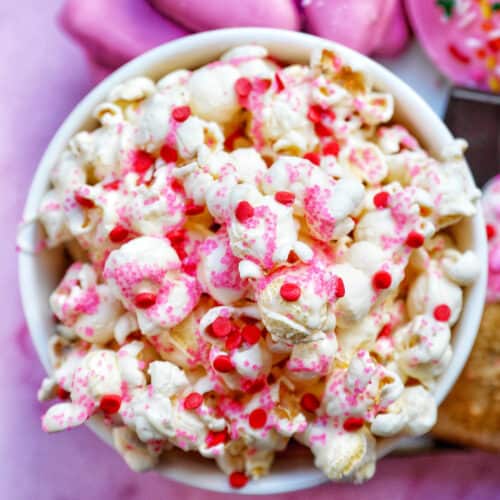 Valentines Day Popcorn in a bowl with pink background