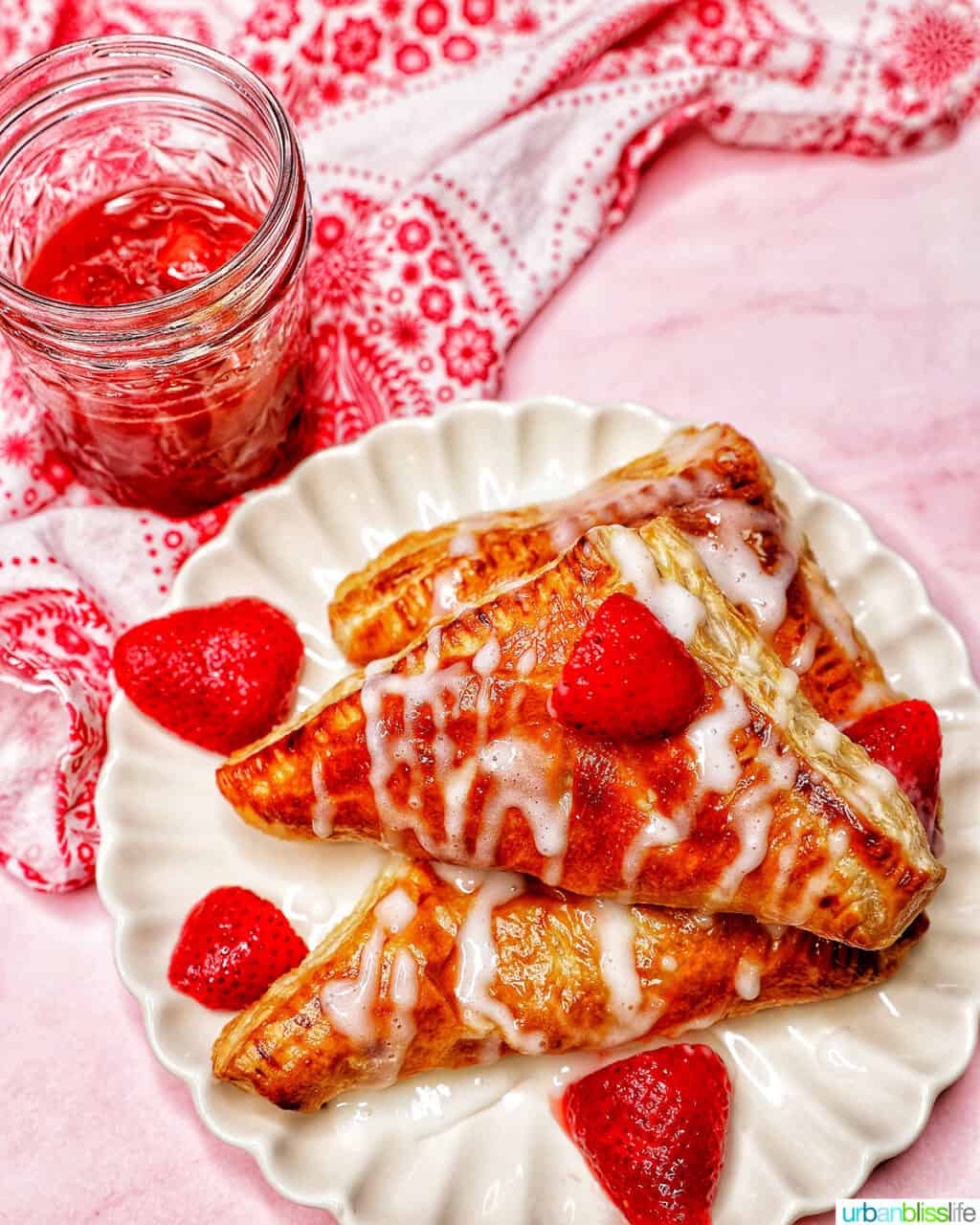 overhead of iced air fryer strawberry turnovers