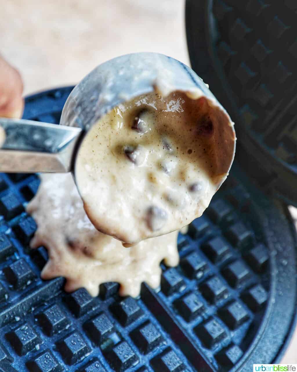 pouring batter into waffle maker