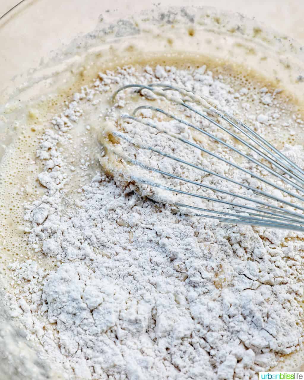 whisking together ingredients