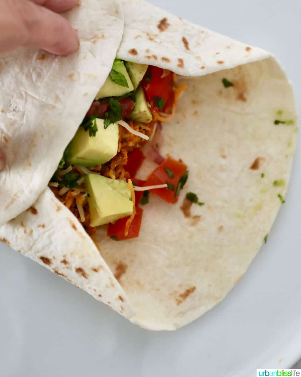 folding chorizo breakfast burrito