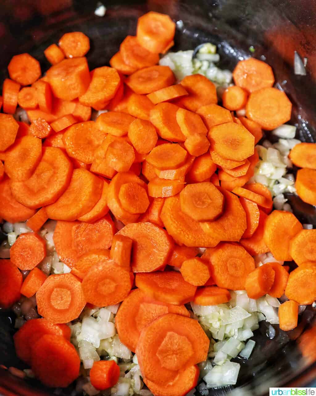 adding carrots to beef caldereta