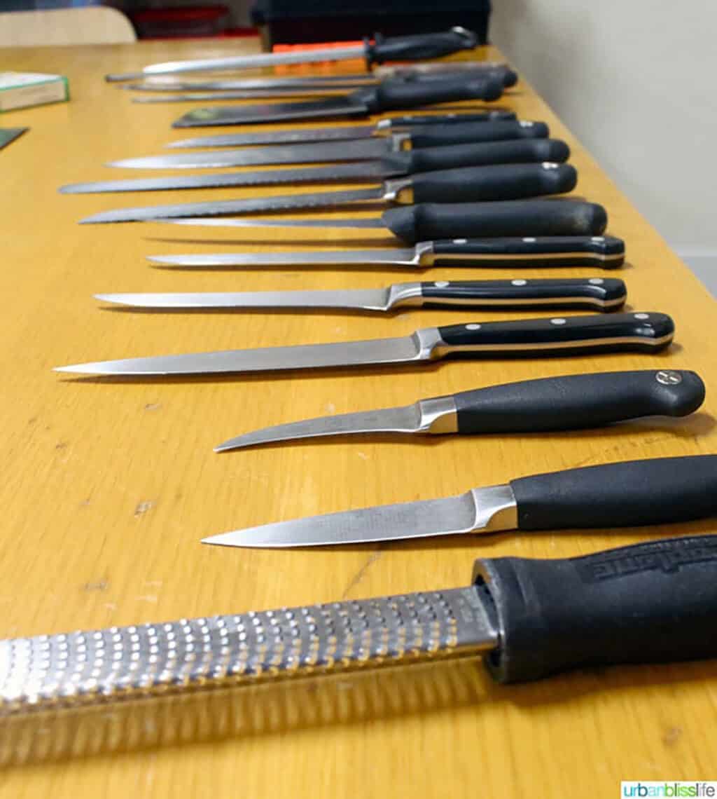 the knife guide - several kitchen knives on a table
