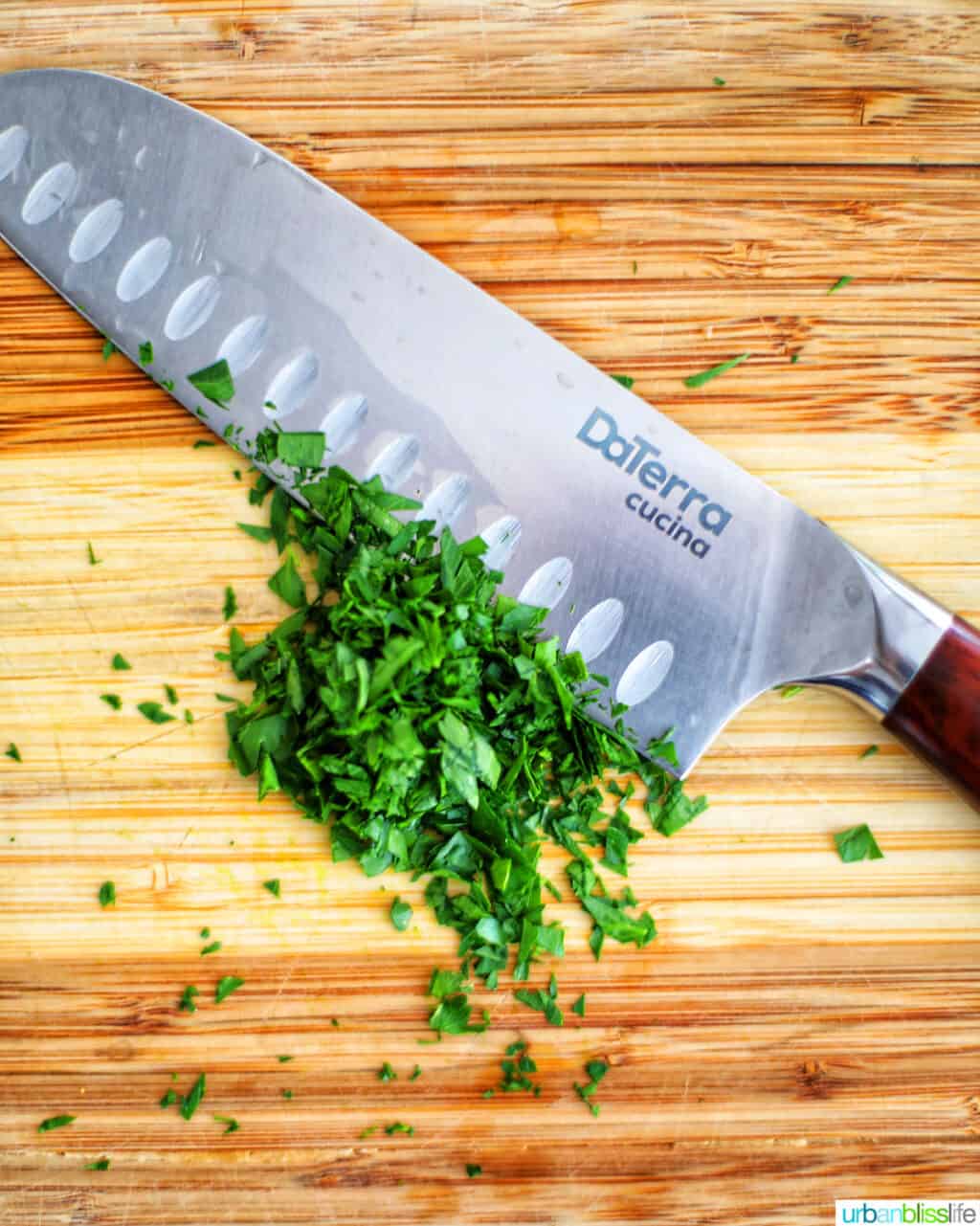 types of kitchen knives - santoku knife with herbs