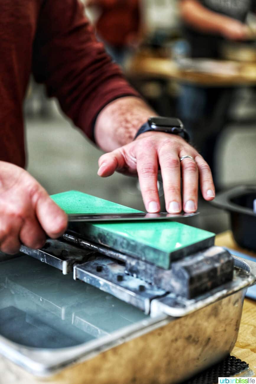 sharpening a kitchen knife using
a whetstone