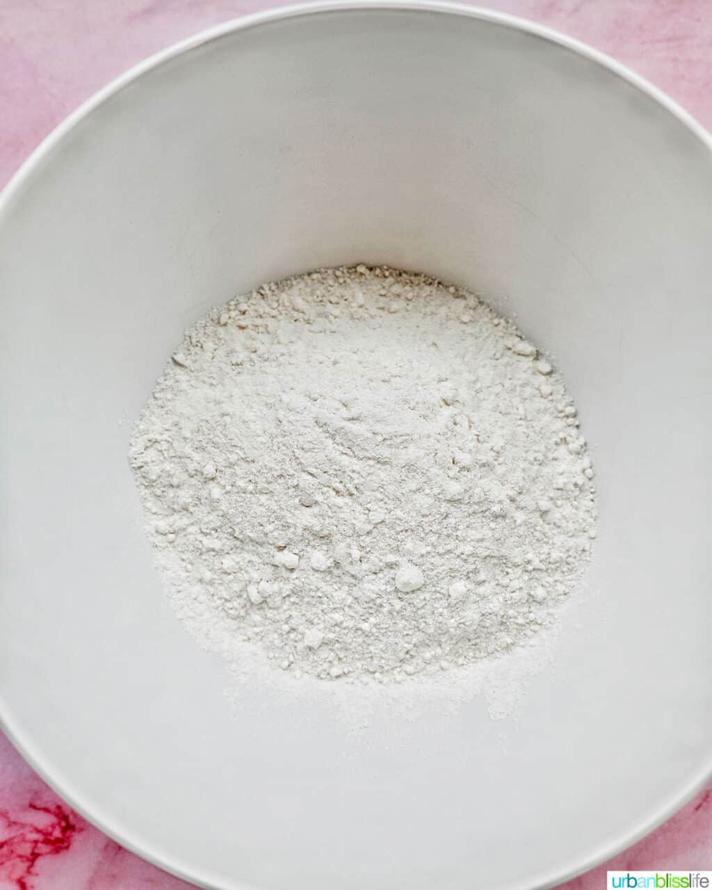 white bowl with strawberry cake mix